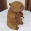 Peluche Capibara con bufanda y manta