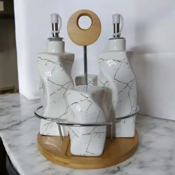 SET DE PORCELANA ( SALERO, PIMENTERO, ACEITERO Y VINAGRERO) BLANCO